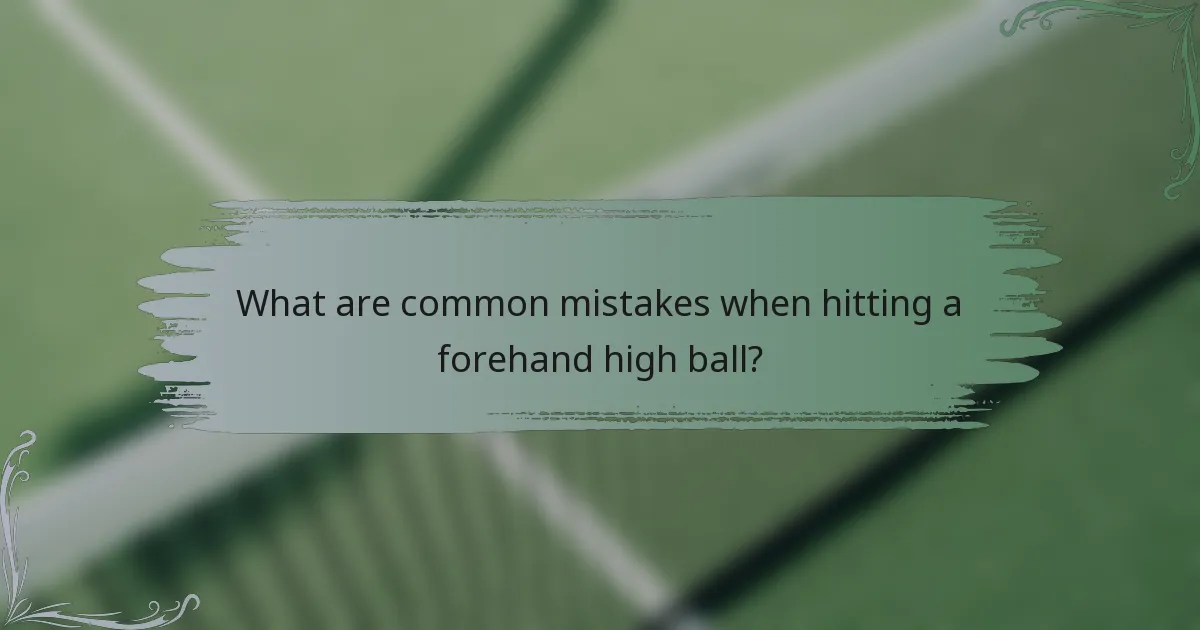 What are common mistakes when hitting a forehand high ball?